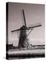 Netherlands, Kinderdijk. Windmills at sunset in Kinderdijk-Terry Eggers-Stretched Canvas