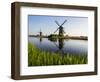 Netherlands, Kinderdijk, Windmills with evening light along the canals.-Terry Eggers-Framed Photographic Print