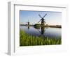 Netherlands, Kinderdijk, Windmills with evening light along the canals.-Terry Eggers-Framed Photographic Print