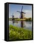 Netherlands, Kinderdijk, Windmills with evening light along the canals.-Terry Eggers-Framed Stretched Canvas