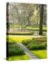 Netherlands, Lisse. Path leading through spring flowers-Terry Eggers-Stretched Canvas