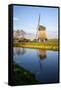 Netherlands, Lisse, Windmill on a Canal-Hollice Looney-Framed Stretched Canvas
