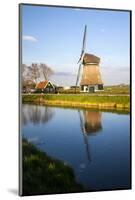 Netherlands, Lisse, Windmill on a Canal-Hollice Looney-Mounted Photographic Print