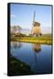 Netherlands, Lisse, Windmill on a Canal-Hollice Looney-Framed Stretched Canvas