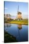 Netherlands, Lisse, Windmill on a Canal-Hollice Looney-Stretched Canvas