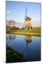 Netherlands, Lisse, Windmill on a Canal-Hollice Looney-Mounted Photographic Print