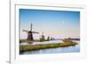 Netherlands, South Holland, Kinderdijk, UNESCO World Heritage Site. The moon rises above historic D-Jason Langley-Framed Photographic Print