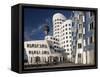 Neuer Zollhof Office Buildings with Rheinturm in Background, Medienhafen, Dusseldorf, Germany, Euro-David Clapp-Framed Stretched Canvas