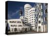 Neuer Zollhof Office Buildings with Rheinturm in Background, Medienhafen, Dusseldorf, Germany, Euro-David Clapp-Stretched Canvas