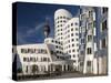 Neuer Zollhof Office Buildings with Rheinturm in Background, Medienhafen, Dusseldorf, Germany, Euro-David Clapp-Stretched Canvas