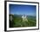 Neuschwanstein Castle on a Wooded Hill with Mountains in the Background, in Bavaria, Germany-null-Framed Photographic Print