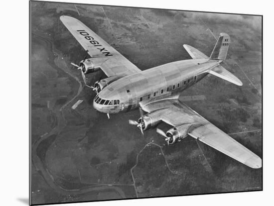 New Boeing Stratoliner Four Engine Passenger Plane in Flight-null-Mounted Photographic Print