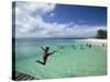 New Caledonia, Amedee Islet, Polynesian Kids Playing on Amedee Islet Beach-Walter Bibikow-Stretched Canvas