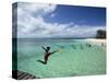 New Caledonia, Amedee Islet, Polynesian Kids Playing on Amedee Islet Beach-Walter Bibikow-Stretched Canvas