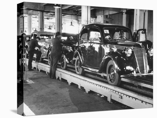 New Fiat Cars Sitting on the Assembly Line at the Fiat Auto Factory-Carl Mydans-Stretched Canvas