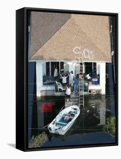 New Orleans Residents Wait to Be Rescued from the Floodwaters of Hurricane Katrina-null-Framed Stretched Canvas