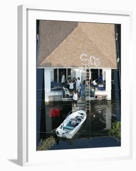 New Orleans Residents Wait to Be Rescued from the Floodwaters of Hurricane Katrina-null-Framed Photographic Print