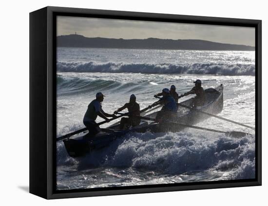 New South Wales, A Surfboat Crew Battles Through Waves at Cronulla Beach in Sydney, Australia-Andrew Watson-Framed Stretched Canvas