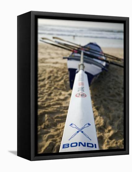 New South Wales, Sydney, A Surfboat Sits on Beach at Bondi in Sydney's Eastern Beaches, Australia-Andrew Watson-Framed Stretched Canvas