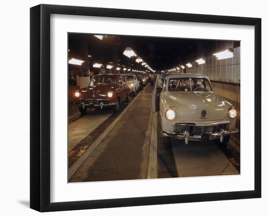 New Studebakers Coming Off the Assembly Line in South Bend, Indiana. 1946-Bernard Hoffman-Framed Photographic Print