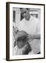 New U.S. Army draft recruit getting his hair cut by a barber, May 15 1967-Warren K. Leffler-Framed Photographic Print