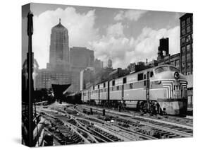 New York Central Passenger Train with a Streamlined Locomotive Leaving Chicago Station-Andreas Feininger-Stretched Canvas