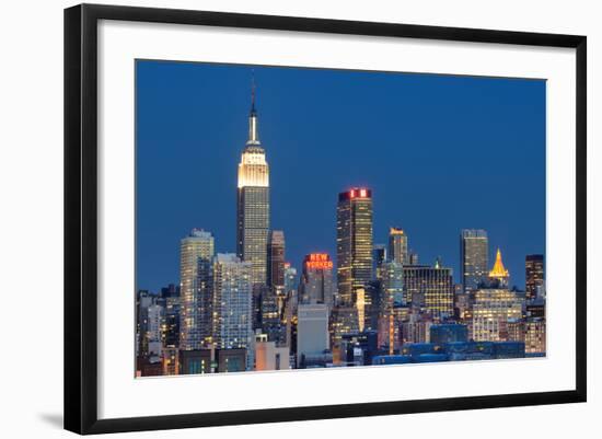 NEW YORK CITY - AUGUST 24: Landmark Buildings including New Yorker Hotel and Empire State Building-SeanPavonePhoto-Framed Photographic Print