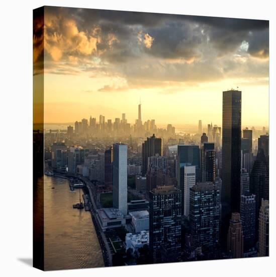 New York City - Beautiful Colorful Sunset over Manhattan Fit Sunbeams between Buildings-IM_photo-Stretched Canvas