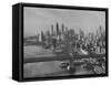 New York City Behind the Brooklyn and Manhattan Bridges That are Hovering over the East River-Dmitri Kessel-Framed Stretched Canvas