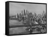 New York City Behind the Brooklyn and Manhattan Bridges That are Hovering over the East River-Dmitri Kessel-Framed Stretched Canvas