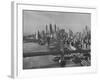 New York City Behind the Brooklyn and Manhattan Bridges That are Hovering over the East River-Dmitri Kessel-Framed Photographic Print