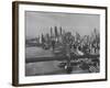 New York City Behind the Brooklyn and Manhattan Bridges That are Hovering over the East River-Dmitri Kessel-Framed Photographic Print