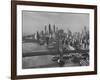 New York City Behind the Brooklyn and Manhattan Bridges That are Hovering over the East River-Dmitri Kessel-Framed Photographic Print