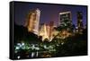 New York City Central Park at Night with Manhattan Skyscrapers Lit with Light.-Songquan Deng-Framed Stretched Canvas