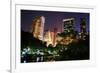 New York City Central Park at Night with Manhattan Skyscrapers Lit with Light.-Songquan Deng-Framed Photographic Print