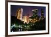 New York City Central Park at Night with Manhattan Skyscrapers Lit with Light.-Songquan Deng-Framed Photographic Print