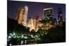 New York City Central Park at Night with Manhattan Skyscrapers Lit with Light.-Songquan Deng-Mounted Photographic Print