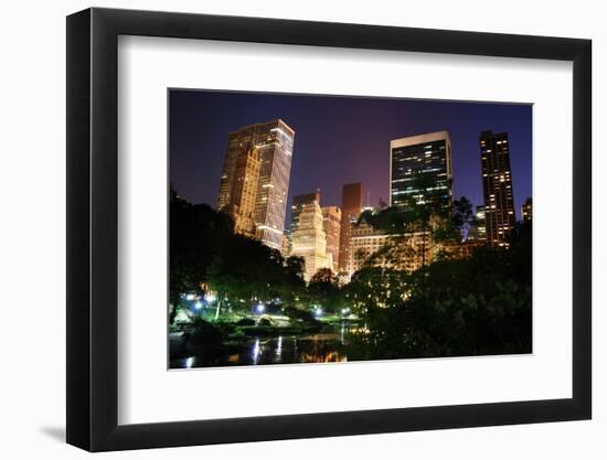 New York City Central Park at Night with Manhattan Skyscrapers Lit with Light.-Songquan Deng-Framed Photographic Print