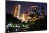 New York City Central Park at Night with Manhattan Skyscrapers Lit with Light.-Songquan Deng-Mounted Photographic Print