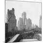 New York City Skyscrapers and Hotel Seen from Pedestrian Bridge-null-Mounted Photographic Print