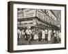 New York City Street Corner with Customers Ordering and Eating Nathan's Hot Dogs-null-Framed Photo