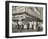 New York City Street Corner with Customers Ordering and Eating Nathan's Hot Dogs-null-Framed Photo