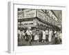 New York City Street Corner with Customers Ordering and Eating Nathan's Hot Dogs-null-Framed Photo