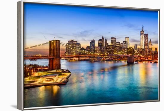 New York City, USA Skyline over East River and Brooklyn Bridge.-SeanPavonePhoto-Framed Photographic Print