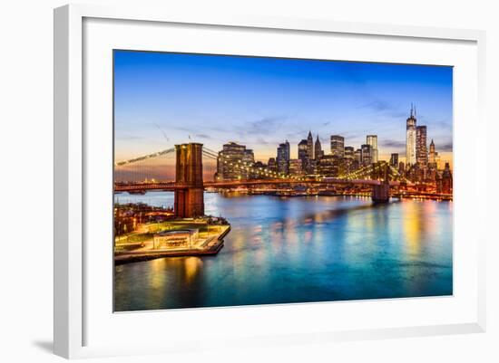 New York City, USA Skyline over East River and Brooklyn Bridge.-SeanPavonePhoto-Framed Photographic Print