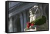 New York Public Library Lion Decorated with a Christmas Wreath during the Holidays.-Jon Hicks-Framed Stretched Canvas