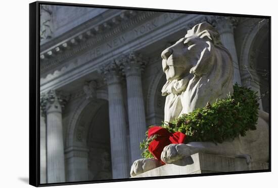New York Public Library Lion Decorated with a Christmas Wreath during the Holidays.-Jon Hicks-Framed Stretched Canvas