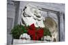 New York Public Library Lion Decorated with a Christmas Wreath during the Holidays.-Jon Hicks-Mounted Photographic Print