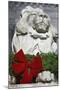 New York Public Library Lion Decorated with a Christmas Wreath during the Holidays.-Jon Hicks-Mounted Photographic Print