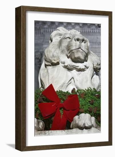 New York Public Library Lion Decorated with a Christmas Wreath during the Holidays.-Jon Hicks-Framed Photographic Print